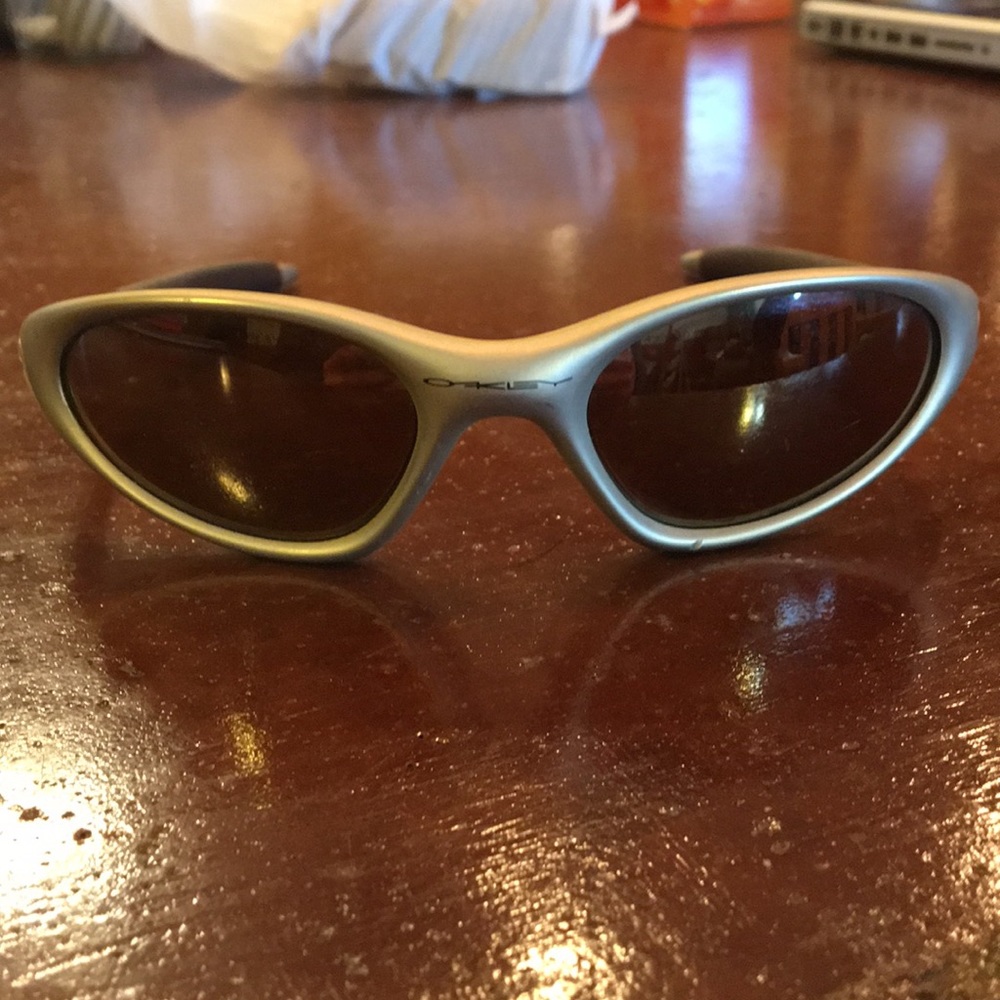 Gold Oakley Minute sunglasses